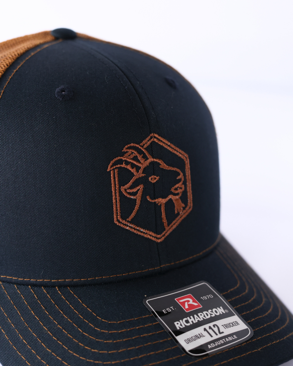 Embroidered Goat Logo Premium Trucker Hat -  Navy & Gold